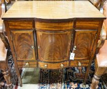 An Edwardian ebony strung mahogany bow front hinged top cabinet, width 77cm, depth 49cm, height