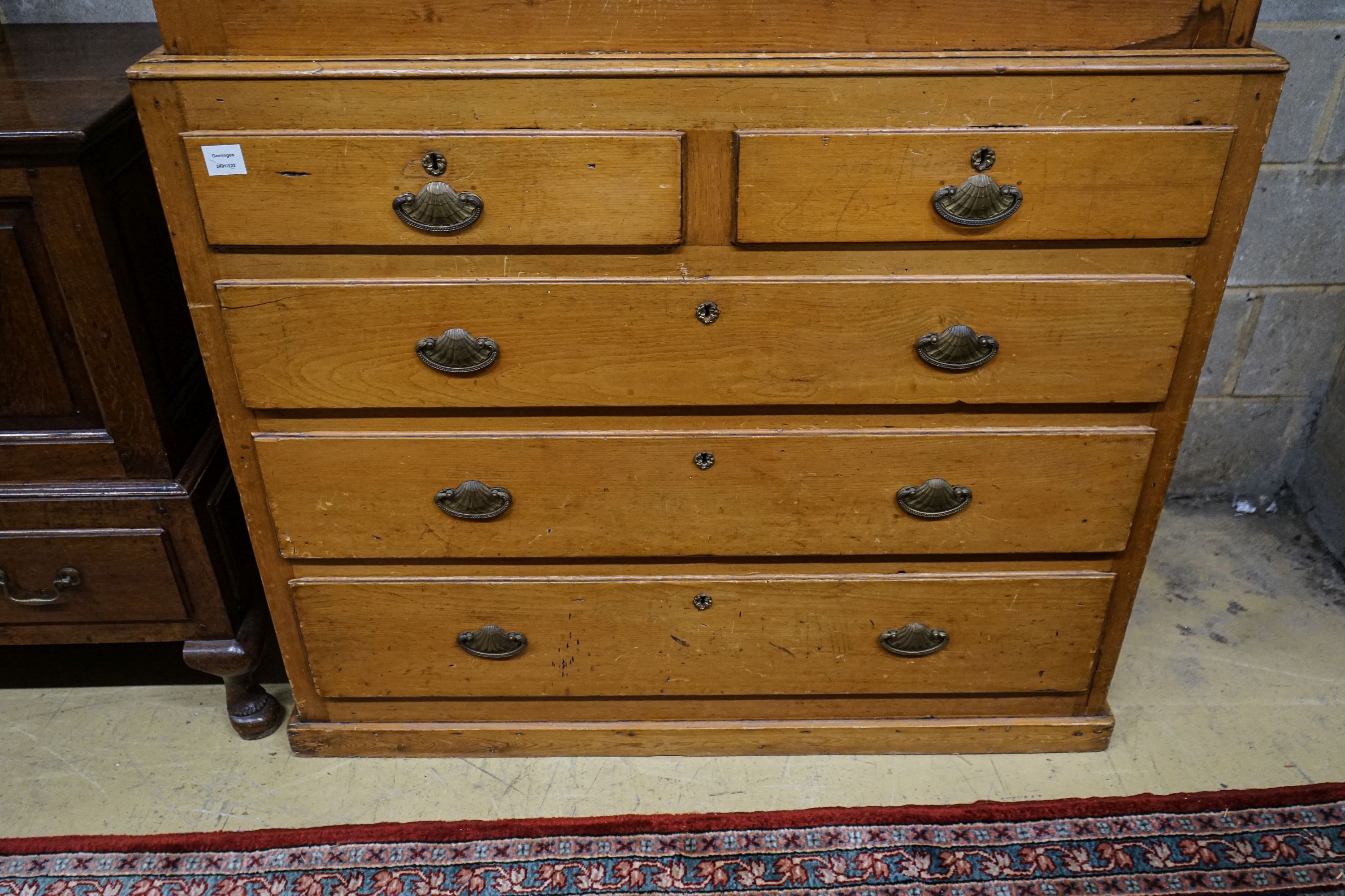 An early Victorian pine kitchen cabinet, with two panelled doors over two short and three long - Image 2 of 3