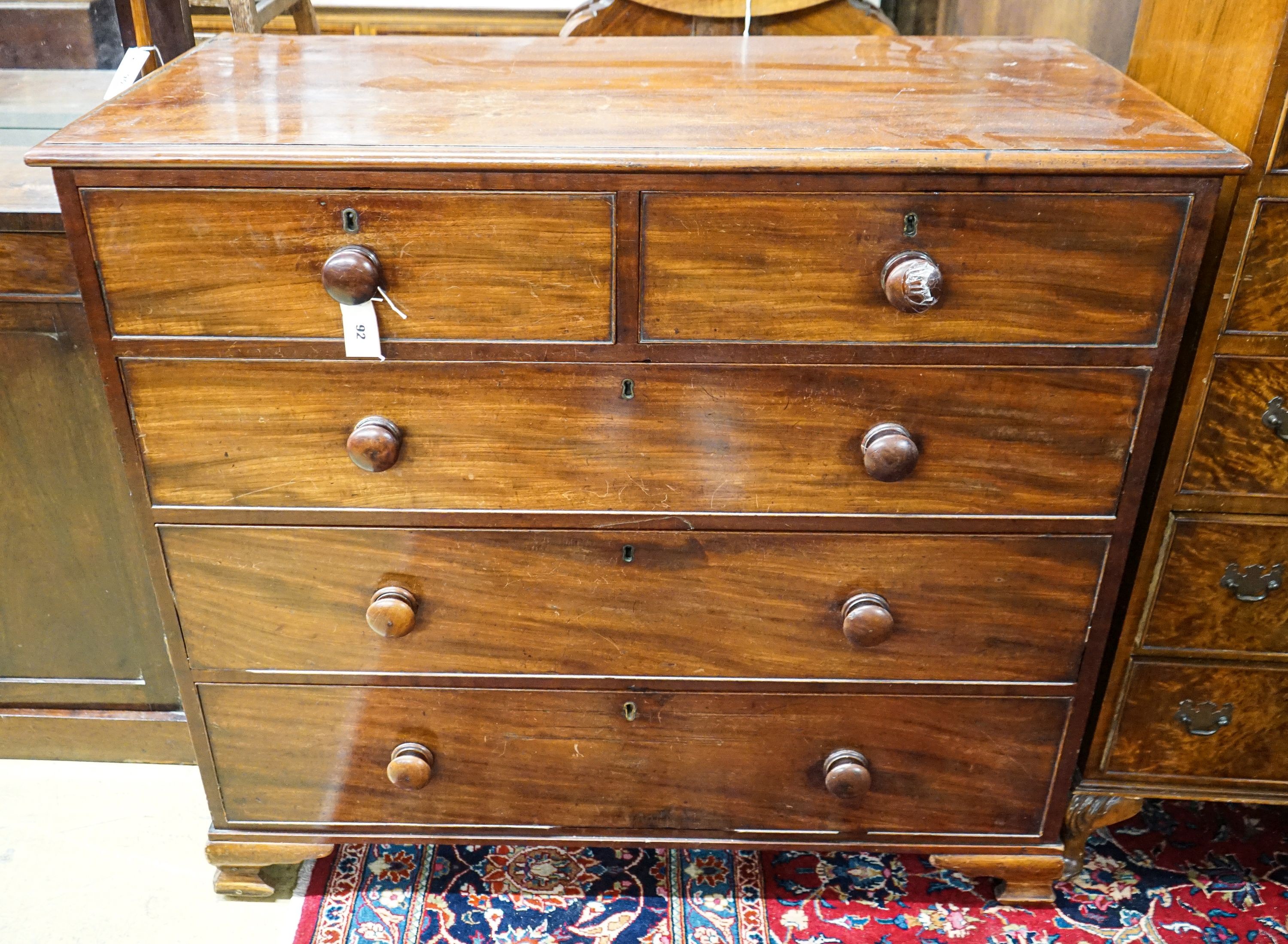 A Victorian mahogany chest fitted two short and three long drawers on bracket feet, width 108cm, - Image 5 of 5