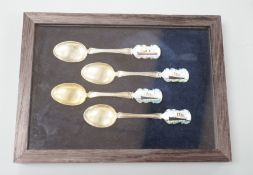 Cunard and P&O liners interest - four early 20th century silver and enamel souvenir spoons,