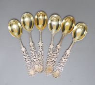 A set of six silver coffee spoons, with fancy pierced stems, Henry Howson, Sheffield, 1890, 11cm, 84