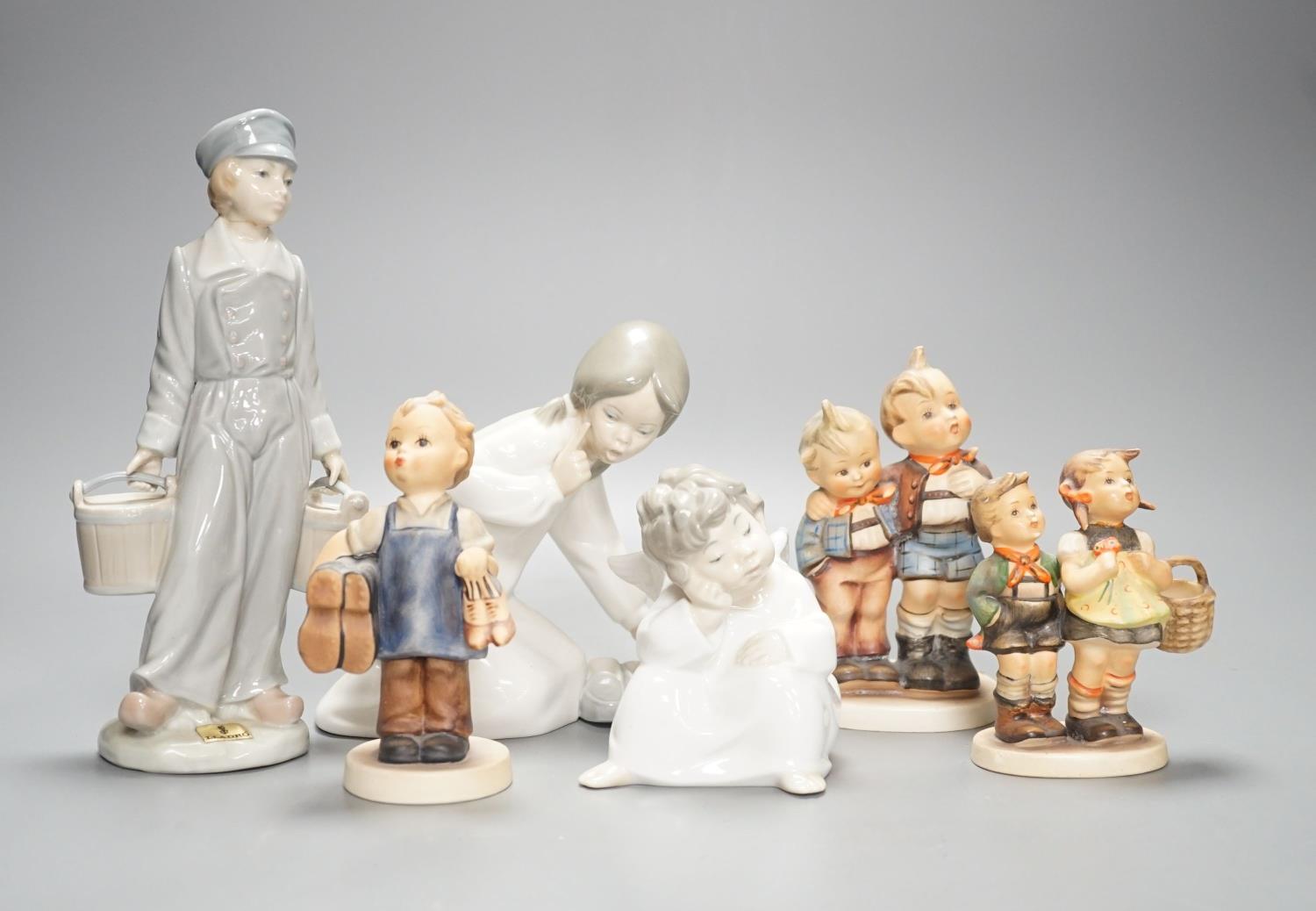 A collection of Lladro and Goebel ceramic figures etc., tallest 30cm