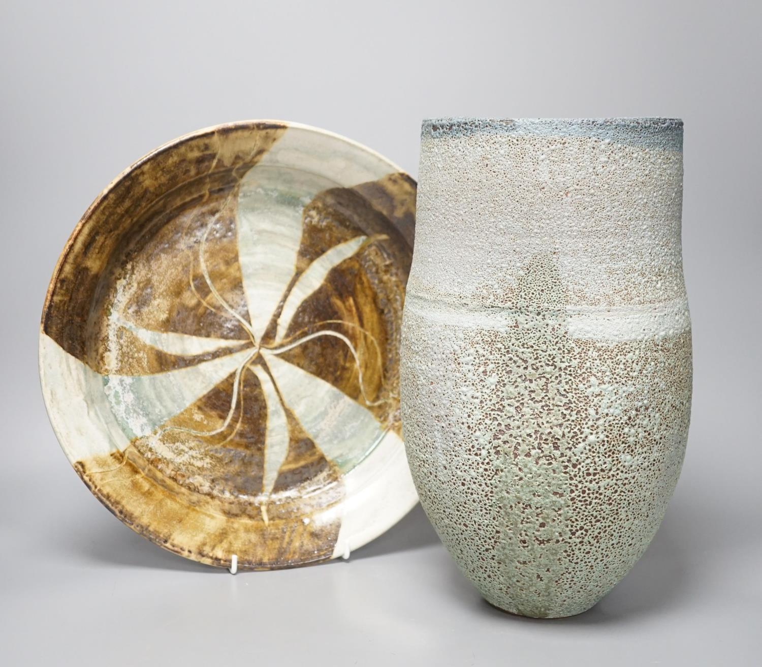 A large raku studio pottery vase, height 33cm, and a stoneware dish