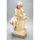 A late 19th century Italian carved alabaster figure of a girl seated, writing at a pillar 47cm