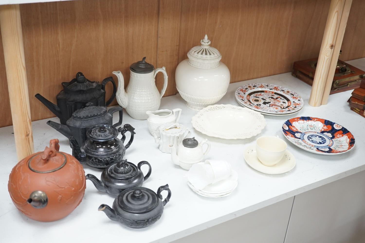 Four 19th century black basalt or black glazed pottery teapots, a large red ware teapot, a creamware - Image 6 of 12