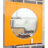 A 1960's orange Perspex framed mirror, 60cm sq.