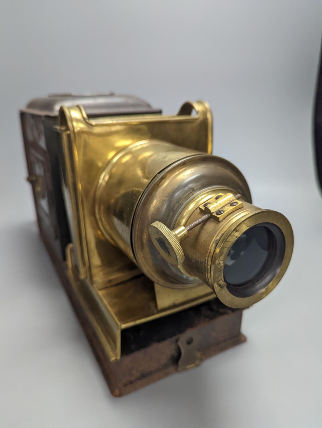 A cased tinplate and pressed brass Magic Lantern, Case 46 cm long - Image 2 of 4