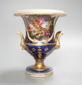 A Herculaneum two handled pedestal campana shaped vase, painted with basket of flowers, within a