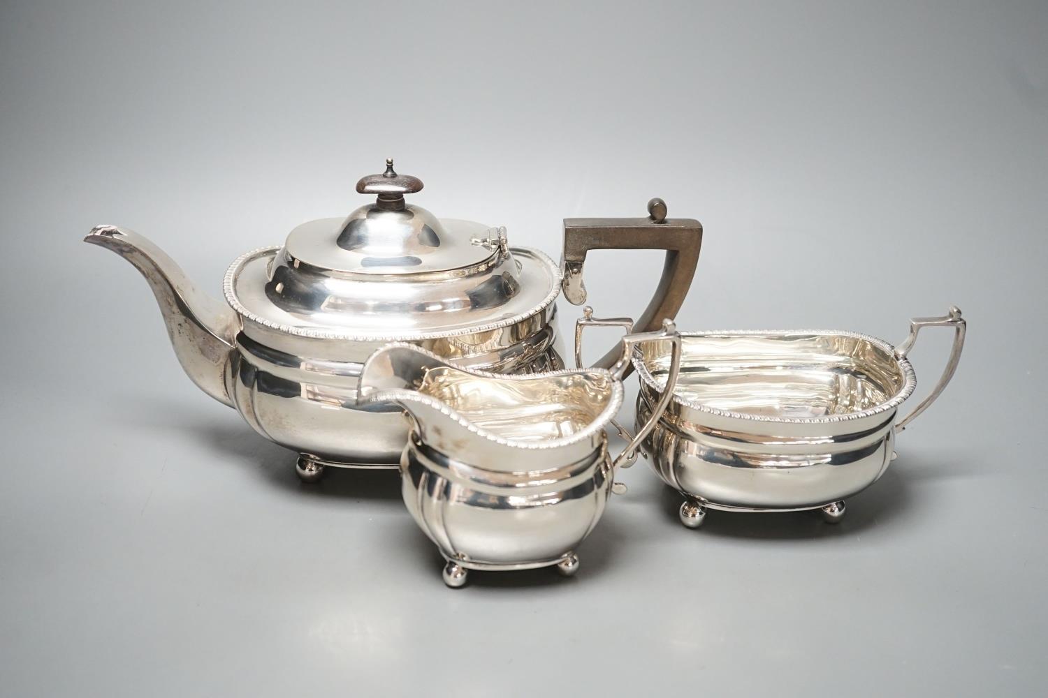 A George V silver three piece tea set, Charles Stuart Harris & Son Ltd, London, 1917, gross 28oz. - Image 2 of 6