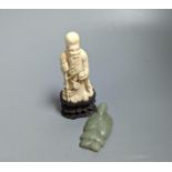 An early 20th century Chinese carved ivory figure of Shao Lao on stand and a jade figural carving