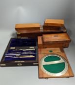 A collection of mahogany cased drawing instruments (8)