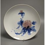 A Chinese floral saucer dish, diameter 23cm