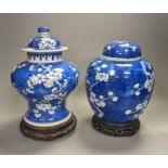 An 18th century Chinese blue and white prunus baluster jar and associated cover and a 19th century