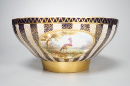 An Aynsley fine bowl with three interior landscape panels and three exterior panels painted with