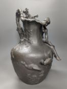 A heavy cast pewter figural ewer, in Art Nouveau style, based on a model by A. Vibert, unsigned,