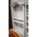 A Victorian style painted domed top open bookcase, width 116cm depth 39cm height 191cm