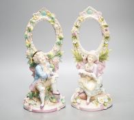 A pair of French porcelain figural photo frames, late 19th century, 24cm