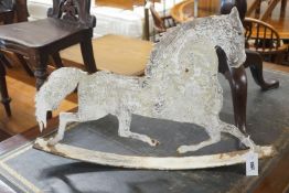 A painted iron rocking horse ornament, length 75cm
