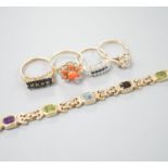 A modern 9ct gold and gem set bracelet and four assorted 9ct gold dress rings, gross 24.8 grams,