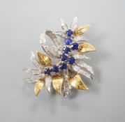 A modern 18ct two colour gold, sapphire and diamond set floral spray brooch, by Cropp & Farr,