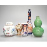 A Chinese green double gourd crackleware vase, a famille rose jar and cover and two Japanese