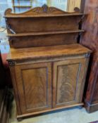 A Refgency flamed mahogany chiffonier, width 94cm, depth 38cm, height 143cm