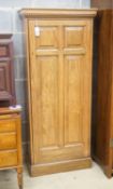 A late 19th / early 20th century walnut panelled bachelor's wardrobe, width 67cm depth 33cm height