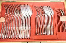 A French 950 standard white metal part canteen of cutlery, comprising fifty nine items, in oak