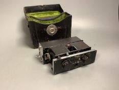 A Polyscop stereo camera together with other 20th century cameras