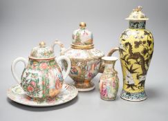 A 19th century Chinese famille rose teapot, sugar bowl, saucer dish vase and a similar yellow ground