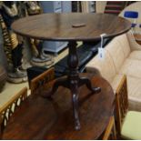 A George III circular tilt top tripod tea table, diameter 86cm, height 72cm