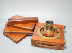 A Thornton Pickard mahogany and brass plate camera, three plates and a stand, 20cm sq.