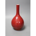 A Chinese red ground bottle vase, Qianlong mark but later 25cm