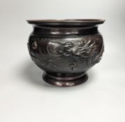 A Japanese bronze ‘dragon’ jardiniere, late 19th century, 26 cm diameter