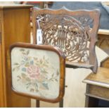 A Victorian rosewood pole screen and a fret cut music stand