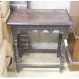 A rectangular carved oak side table, width 66cm depth 40cm height 74cm