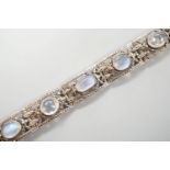 An early 20th century white metal, nine stone cabochon moonstone and marcasite set bracelet, 17.