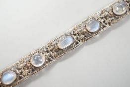 An early 20th century white metal, nine stone cabochon moonstone and marcasite set bracelet, 17.