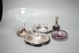 Two pierced silver trinket dishes, a late Victorian silver mounted amethyst glass dish, a similar