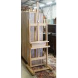 An Italian beech artist studio easel by Mabef, width 60cm height 188cm