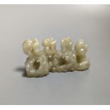 A Chinese celadon jade brush rest, 8cms wide