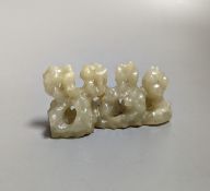 A Chinese celadon jade brush rest, 8cms wide