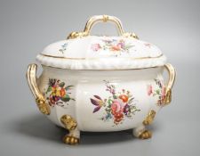 A Derby tureen and cover, early 19th century, on four feet with lion head masks painted with