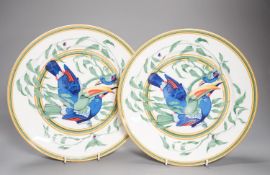 A pair of Hermes, Paris 'Toucan' plates, diameter 27.5cm, edge blemishes