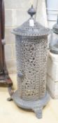 A French pierced enamel cylindrical cast iron conservatory heater, height 110cm