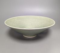 A 19th century Chinese sgraffito celadon glazed dish, diameter 26cm