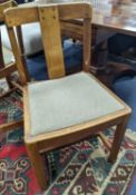 A pair of Arts and Crafts oak side chairs, outer Hebrides