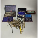 A collection of cased and loose drawing instruments and two empty cases (12)