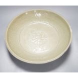 A Chinese Ming Longquan celadon dish, 15th/16th century, rim cut down, width 33cm