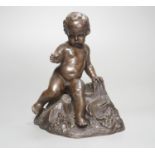 A bronze of a seated boy, height 17cm